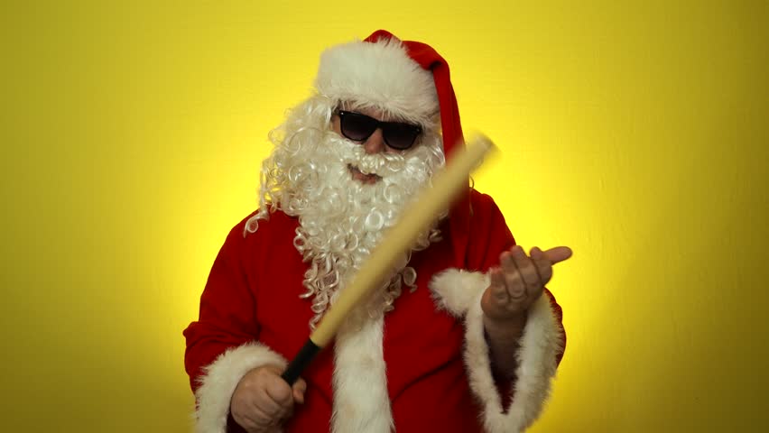 Evil Santa Claus with a baseball bat.