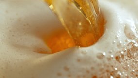 Super Slow Motion Detail Shot of Pouring and Splashing Beer at 1000fps. - Powered by Shutterstock - Get 15% off with code: PIKWIZARD15