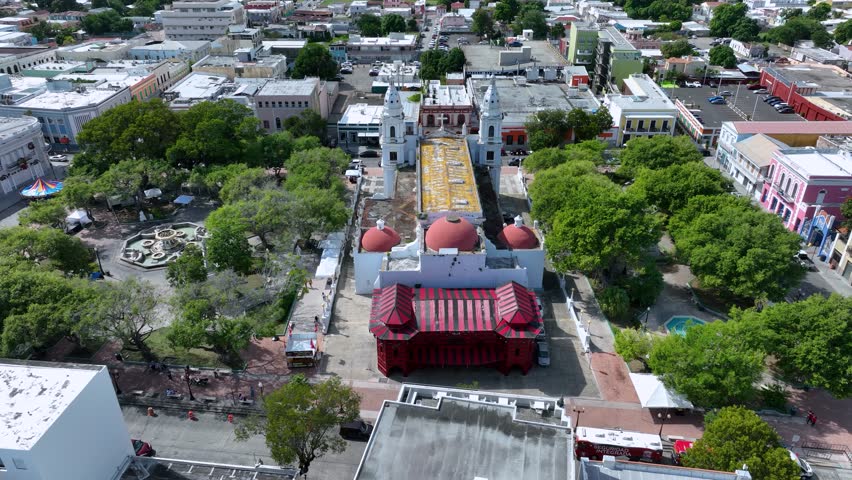 Aerial video of Parque de Bombas and the Catedral Nuestra, Senora de Guadalupe, Ponce, Puerto Rico.