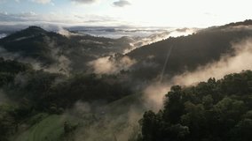 Aerial landscape view of mountains and fog in the morning by drone - Powered by Shutterstock - Get 15% off with code: PIKWIZARD15