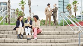 Business, multiethnic, people, financial Diverse business team collaborating outdoors with digital tablet - Powered by Shutterstock - Get 15% off with code: PIKWIZARD15