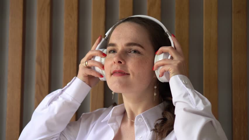 Woman Enjoying Music in Headphones
