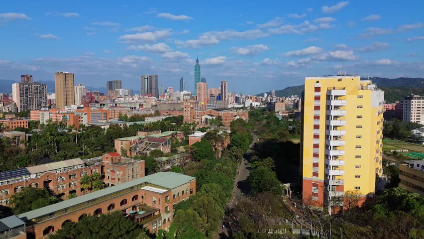 Aerial 4K footage of National Taiwan University with Taipei 101 in Taiwan. The number one university in Taiwan and best in Asia.