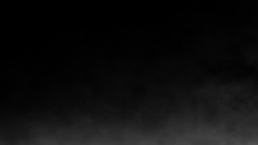White smoke floating on the ground against a black background. Fog effect. 4k animation