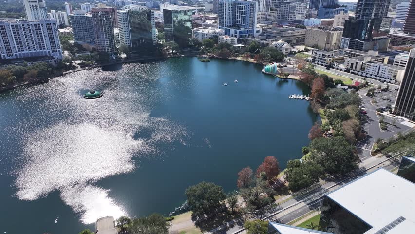 Downtown Orlando In Florida United States. Metropolis Downtown District. Stunning Cityscape. Eola Park Scene. Downtown Orlando In Florida United States. Nature Scenery. Outdoor Skyline.