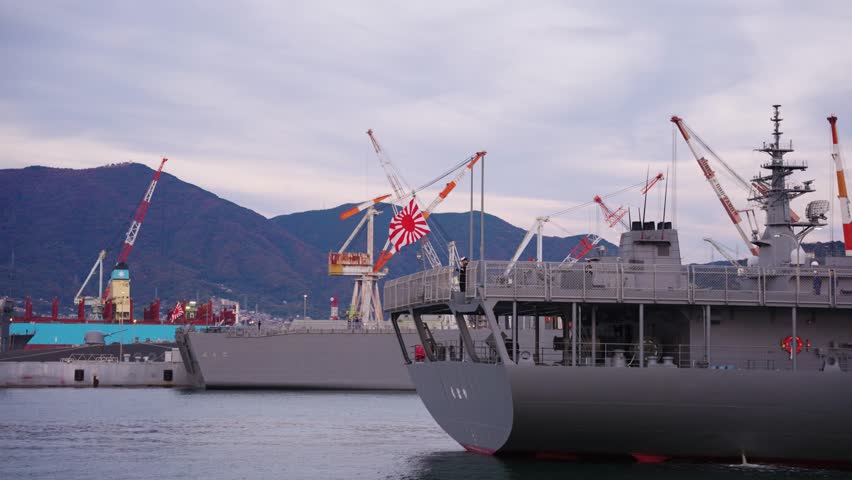 Japanese Naval Ensign Flag Flying on Stern of Battleship, Kure Port, Japan