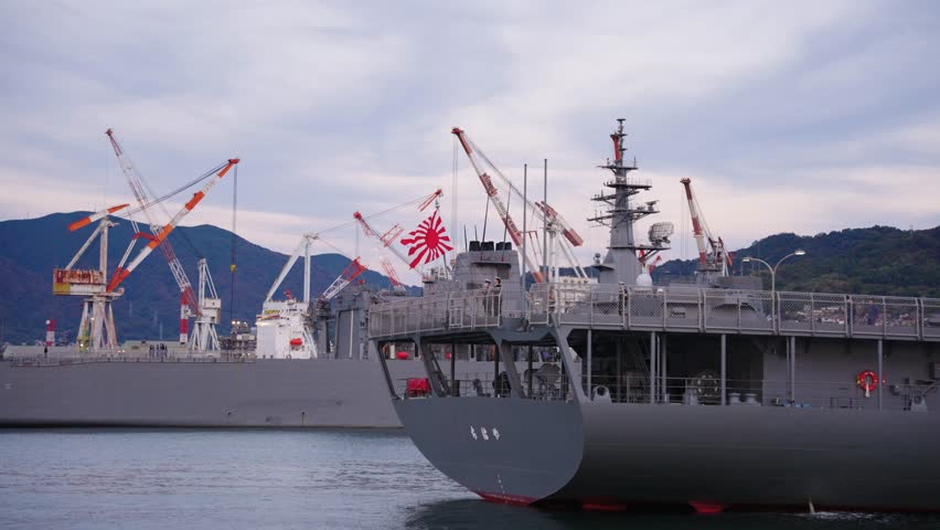 Japanese Naval Ensign Flag Flying on Stern of Battleship, Kure Port, Japan