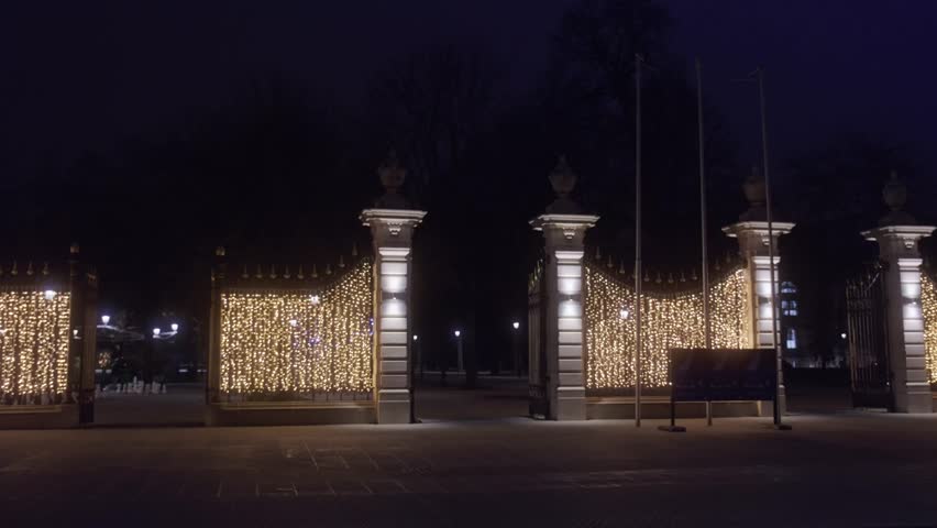 Establishing shot of entrance of Bastion Park at night in Geneva Switzerland