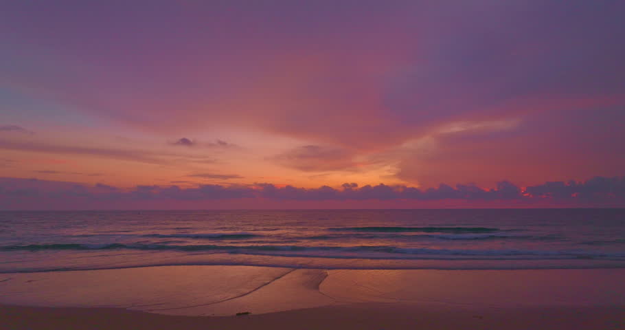 
Aerial view amazing sky at sunset.
Scene of Colorful romantic sky sunset with cloud in sweet sky background.
colorful clouds moving away rolling. 
colorful clouds adorn the sky over the sea