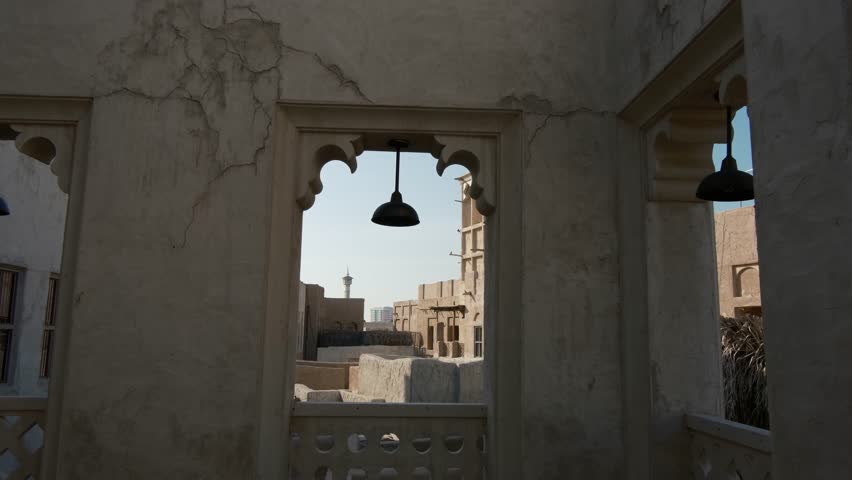 Dubai, United Arab Emirates, 19 January 2024: Al Seef is place for walking, food. historical district with traditional Arabic architecture. old buildings and traditional Arabian street.