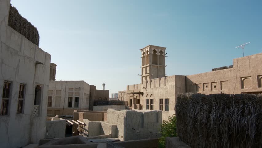 Dubai, United Arab Emirates, 19 January 2024: Al Seef is place for walking, food. historical district with traditional Arabic architecture. old buildings and traditional Arabian street.