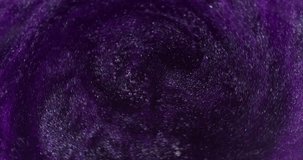 Purple vortex. Spiral paint. Defocused thick dark lilac stream liquid potion mixed with shiny sparkles. Violet caramel boils with bubbles texture. - Powered by Shutterstock - Get 15% off with code: PIKWIZARD15