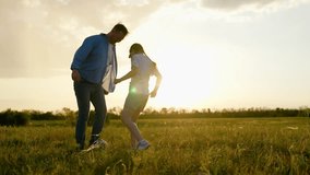 Dad daughter child kicks ball. Happy family playing football. Family have fun playing soccer ball on lawn in park. Young family sport soccer team playing outdoor. Dad kid girl play together, teamwork - Powered by Shutterstock - Get 15% off with code: PIKWIZARD15