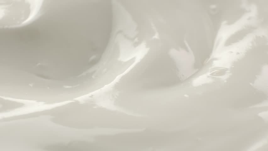 Close-up of spoon and natural yogurt texture, concept video for commercial