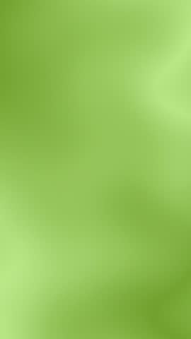 Moving background with green and pastel green colors. Smooth animation with gradient, liquid and fluid colors. Vertical video.