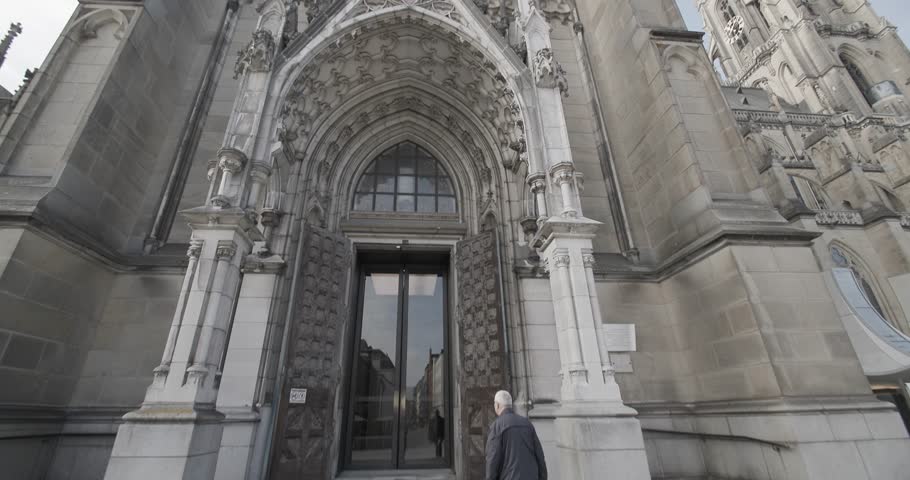 gothic portal entrance with stone saints