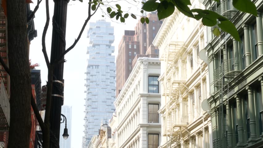 New York City Manhattan Soho fashion district near Broadway street. USA urban building facade, old american architecture. Shopping in NYC, United States. Business and residential real estate. Lantern