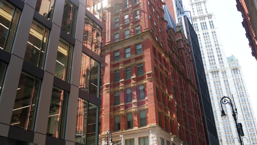 New York City Lower Manhattan, Downtown Financial District architecture, United States. Woolworth building high-rise skyscraper, Beekman street, USA. American urban scene. Gothic tower, NYC. Red brick