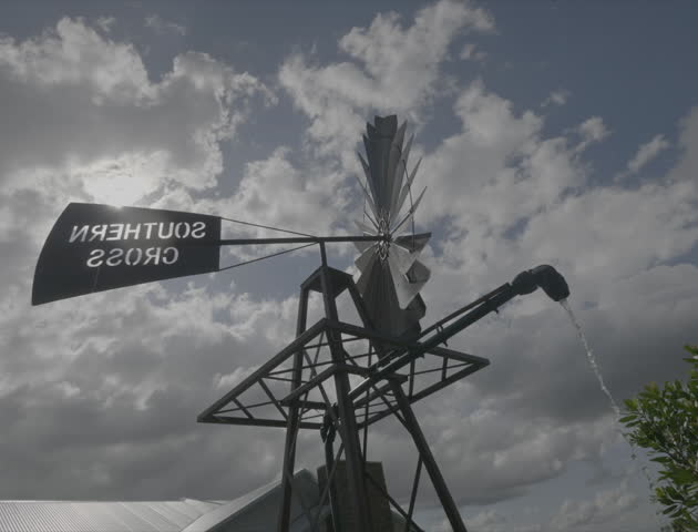 Windmill blowing in the wind with southern cross