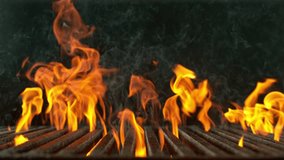 Super Slow Motion of Fire Flames with Cast Iron Grate Isolated on Black Background . Filmed on High Speed Cinema Camera at 1000 fps - Powered by Shutterstock - Get 15% off with code: PIKWIZARD15