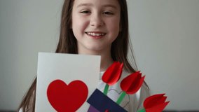 card with heart and bouquet of paper flowers for mother's day, March 8 or birthday. DIY create art for children. craft for kids. girl gives gift to her mom - Powered by Shutterstock - Get 15% off with code: PIKWIZARD15