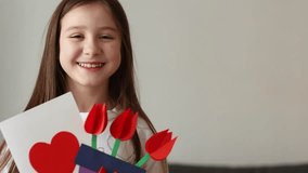 card with heart and bouquet of paper flowers for mother's day, March 8 or birthday. DIY create art for children. craft for kids. girl gives gift to her mom - Powered by Shutterstock - Get 15% off with code: PIKWIZARD15