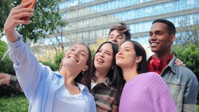A Delightful Group of Friends Enjoying a Lighthearted Moment While Taking a Fun Selfie, Showcasing Genuine Smiles and Laughter, Perfectly Capturing the Essence of Friendship and Joyful Togetherness - Powered by Shutterstock - Get 15% off with code: PIKWIZARD15