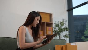 Business entrepreneur, check business growth report, order management in online stores, shopping on the internet, Selling online on the Internet, SME, shipping boxes, e-commerce. - Powered by Shutterstock - Get 15% off with code: PIKWIZARD15