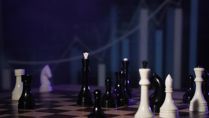 strategy and planning concept, adult man and young woman playing chess on chessboard, close up