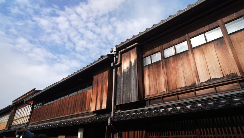 View of traditional dark wood buildings in street in the Higashi Chaya District, Kanazawa City, Ishikawa Prefecture, Honshu, Japan