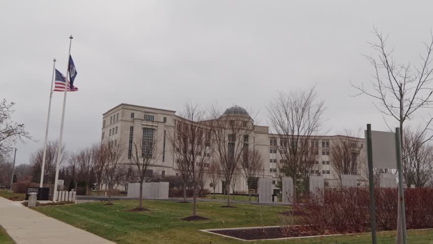 Michigan Hall of Justice building wide angled shot stable video in Lansing, Michigan.