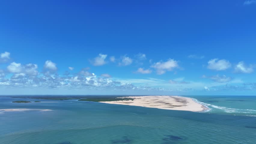 Drone view of the mouth of the São Francisco River. Meeting of the freshwater River with the Atlantic Ocean on the border between Alagoas and Sergipe in Brazil