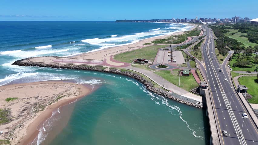 Aerial Footage of Blue Lagoon, River, and Durban City Coastline in South Africa on a Bright Sunny Day