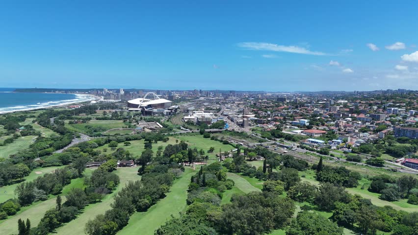 Aerial Footage of Blue Lagoon, River, and Durban City Coastline in South Africa on a Bright Sunny Day