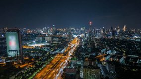 Aerial timelapse of traffic and the Bangkok city skyline at night, Thailand - Powered by Shutterstock - Get 15% off with code: PIKWIZARD15
