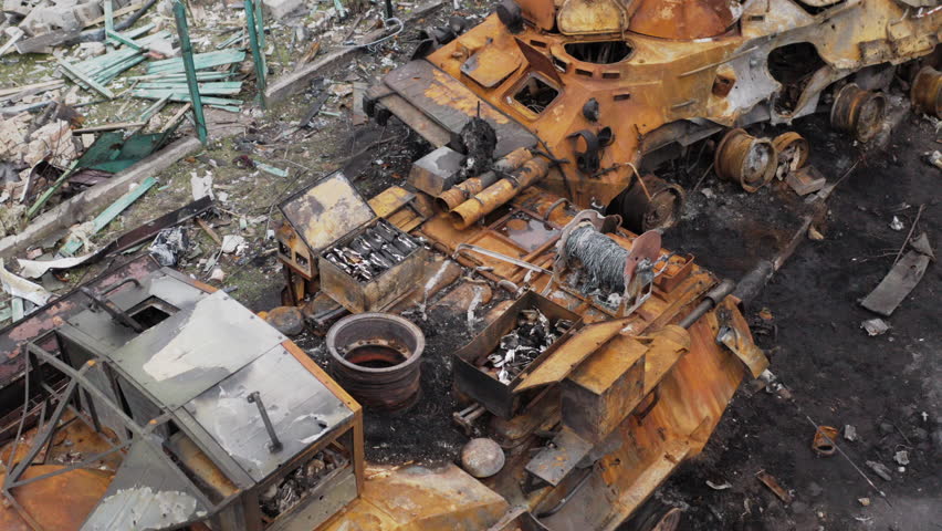 Drone footage of a famous street in Bucha, Ukraine, lined with destroyed Russian military vehicles after the withdrawal of Russian forces.