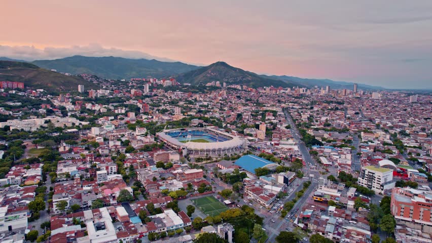 Aerial City Panorama with Mountains and Stadium at Sunset - Cali, Colombia - Powered by Shutterstock - Get 15% off with code: PIKWIZARD15