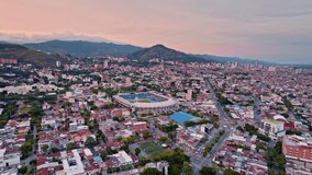 Aerial City Panorama with Mountains and Stadium at Sunset - Cali, Colombia - Powered by Shutterstock - Get 15% off with code: PIKWIZARD15