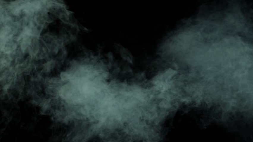 Abstract white smoke in slow motion. Smoke, Cloud of cold fog in light spot background. Light, white, fog, cloud, black background, 4k, ice smoke cloud. Floating fog.