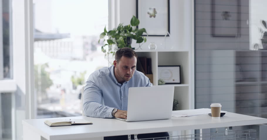 Laptop, 404 and anger with business man at work on error or problem in professional office. Desk, stress and glitch with frustrated young employee breaking workplace computer for corporate compliance