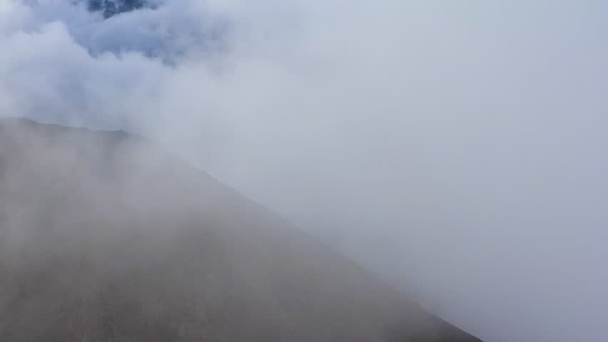 Traveling front within clouds in the Gergeti Glacier region, Georgia