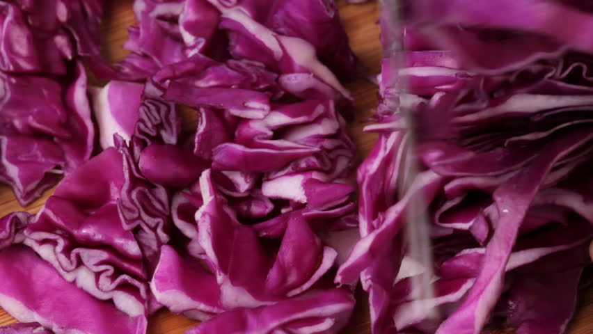 Cutting a red cabbage, shot in HD video