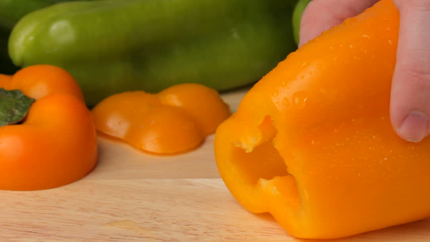 Slicing a yellow pepper, shot in HD video