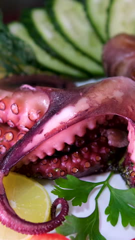 Octopus food seafood vegetables and glass of beer tentacles fresh tasty food dish pescetarianism delicious gourmet food background on the table rustic food top view copy space keto and paleo diet