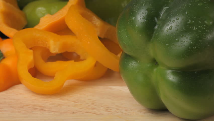 Cutting a green pepper, shot in HD video