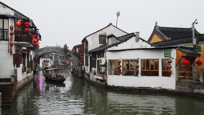 SHANGHAI - DECEMBER 20: Zhujiajiao traditional wooden boat sailing in the river,