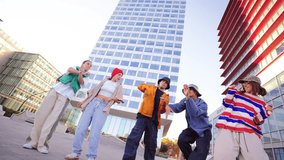Energetic Breakdancer Showcasing a Skillful Freeze Move while Friends Support and Cheer him on during an Exciting Street Dance Performance with Enthusiasm and Passion for hip hop Culture. Vertical - Powered by Shutterstock - Get 15% off with code: PIKWIZARD15