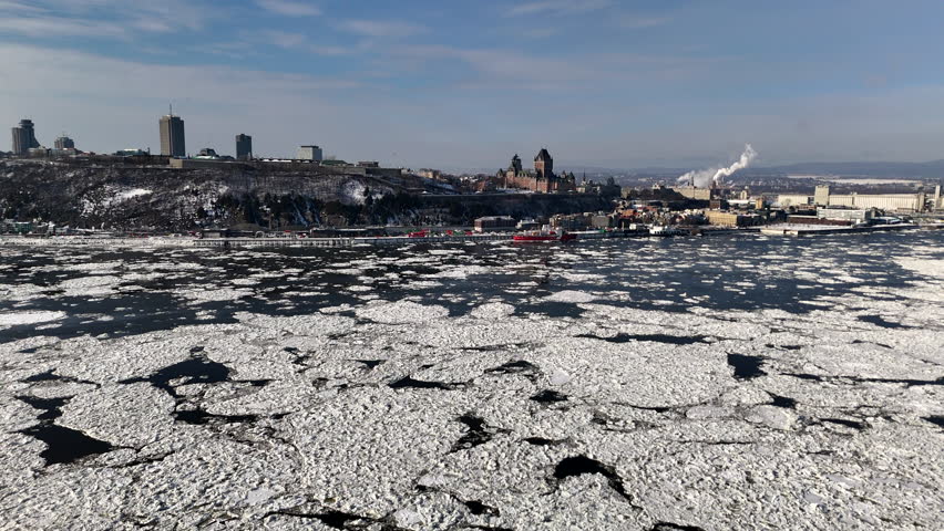 Aerial view of Quebec City in winter with frozen St-Laurence River