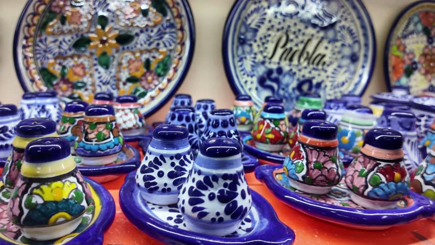 A collection of blue and white ceramic salt and pepper shakers. The blue and white colors give the shakers a vintage and classic look