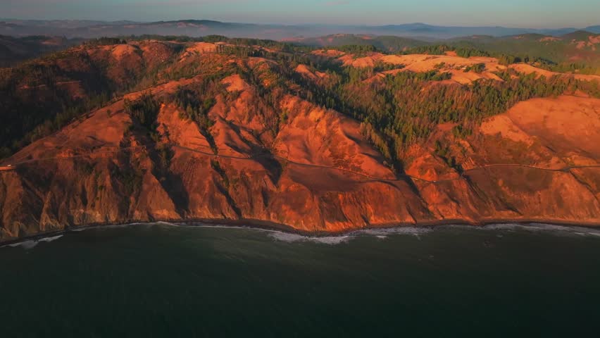 Bolinas Sonoma Coast State Park golden sunset California aerial drone landscape Bodega Bay Fort Ross rugged windy coastal highway Redwoods Point Reyes Big Sur Salmon Creek Pacific Ocean forward pan up